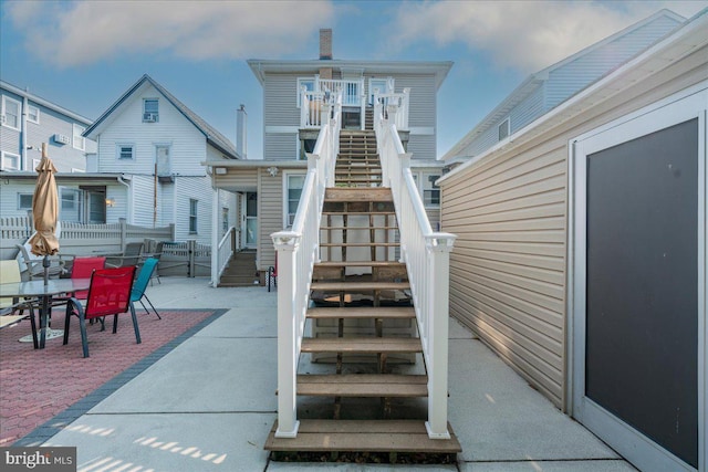 rear view of house with a patio