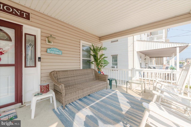 view of patio featuring a porch