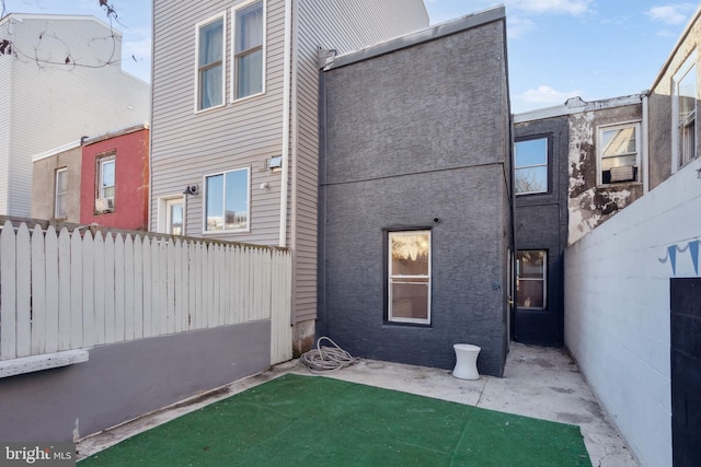 rear view of house featuring a patio