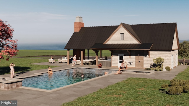 view of pool featuring a yard and a patio