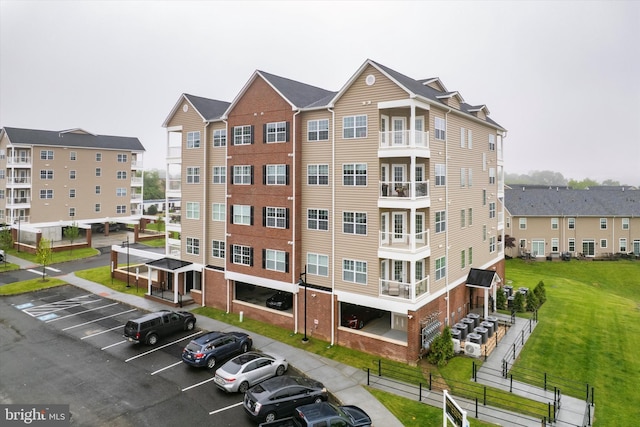 16423 River View Dr, Bristol, PA 19007 - view of building exterior with uncovered parking and fence