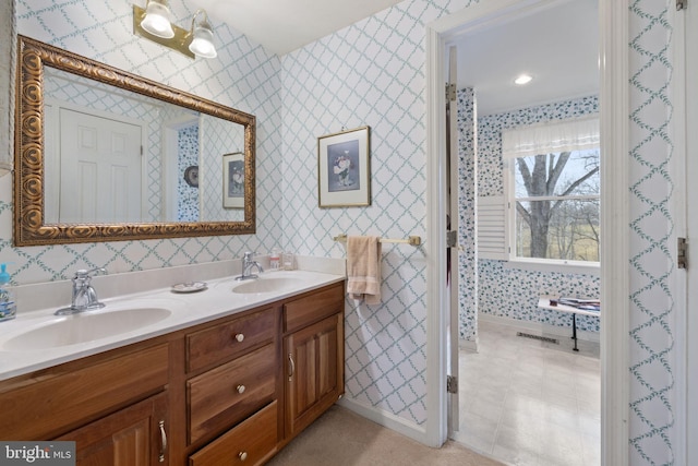 bathroom with tile flooring and dual bowl vanity