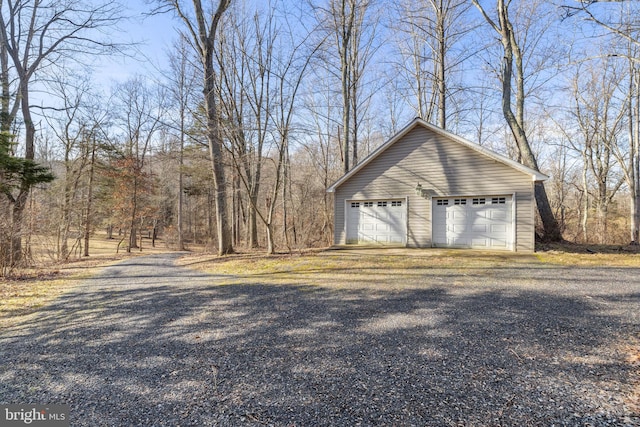 view of property exterior with a garage