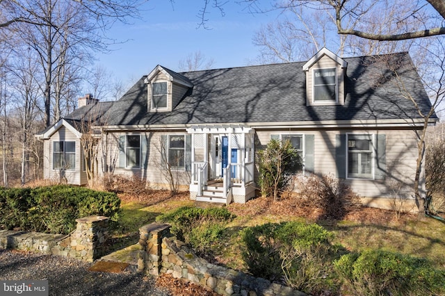 view of front of home with a pergola