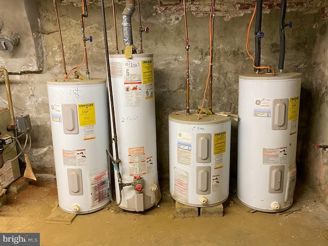 utility room with water heater and gas water heater