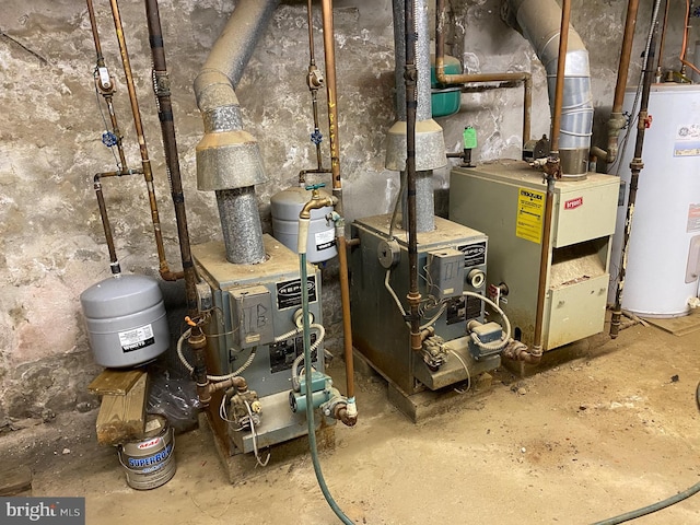 utility room featuring water heater