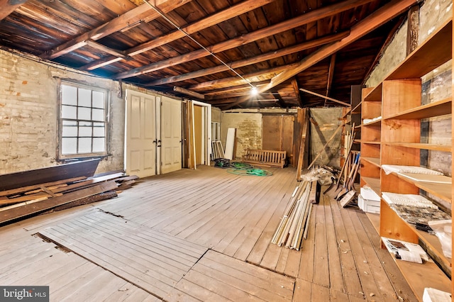 basement with wood ceiling and light wood-type flooring