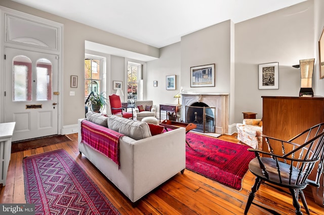 living room featuring dark wood-type flooring