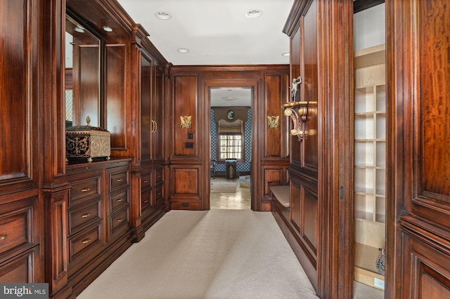 spacious closet featuring light carpet