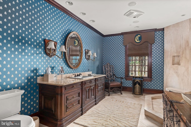 bathroom with crown molding, toilet, vanity, and tile flooring