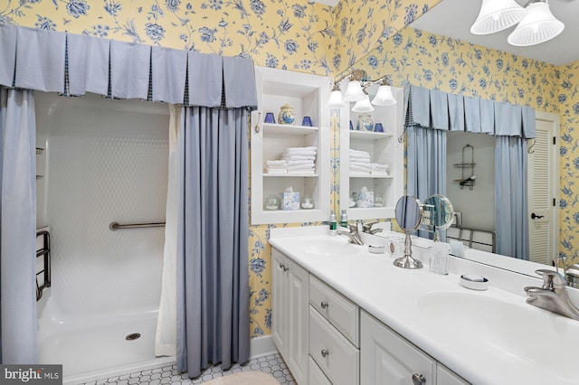 bathroom featuring double sink vanity and tile flooring