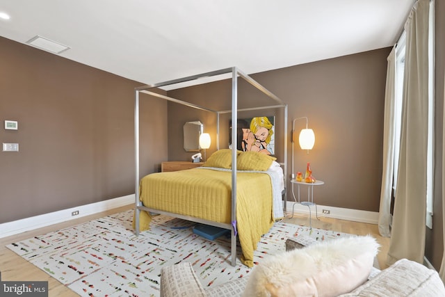 bedroom featuring light wood-type flooring