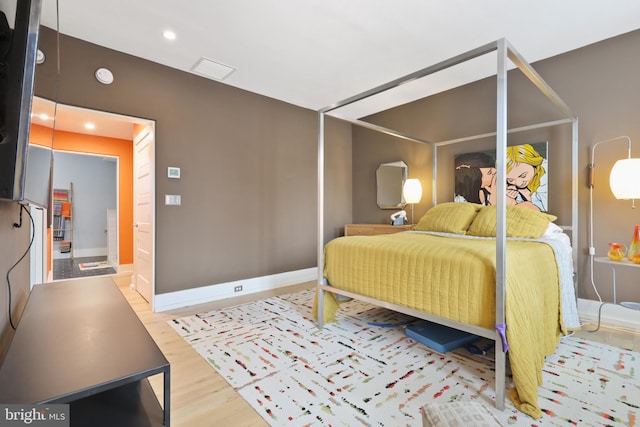 bedroom featuring light wood-type flooring