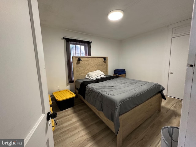 bedroom featuring hardwood / wood-style floors