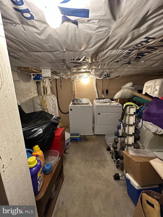 basement with washing machine and dryer