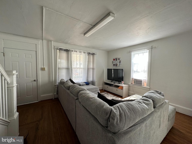 living room with dark hardwood / wood-style floors