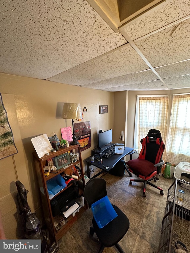 office area featuring a paneled ceiling