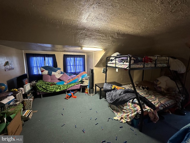 carpeted bedroom featuring a textured ceiling