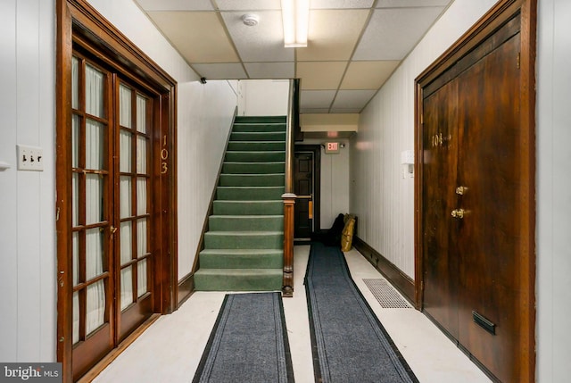 entrance foyer with a paneled ceiling