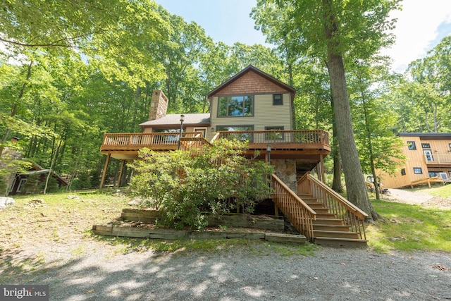 view of front of house featuring a wooden deck