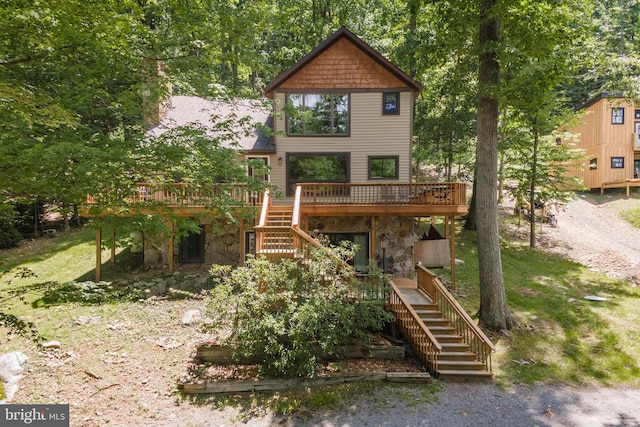 view of front of property featuring a wooden deck