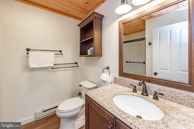 bathroom with wooden ceiling, baseboard heating, toilet, vanity, and hardwood / wood-style floors