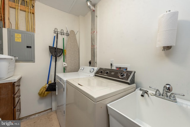 laundry room with washer hookup, washing machine and dryer, cabinets, and sink