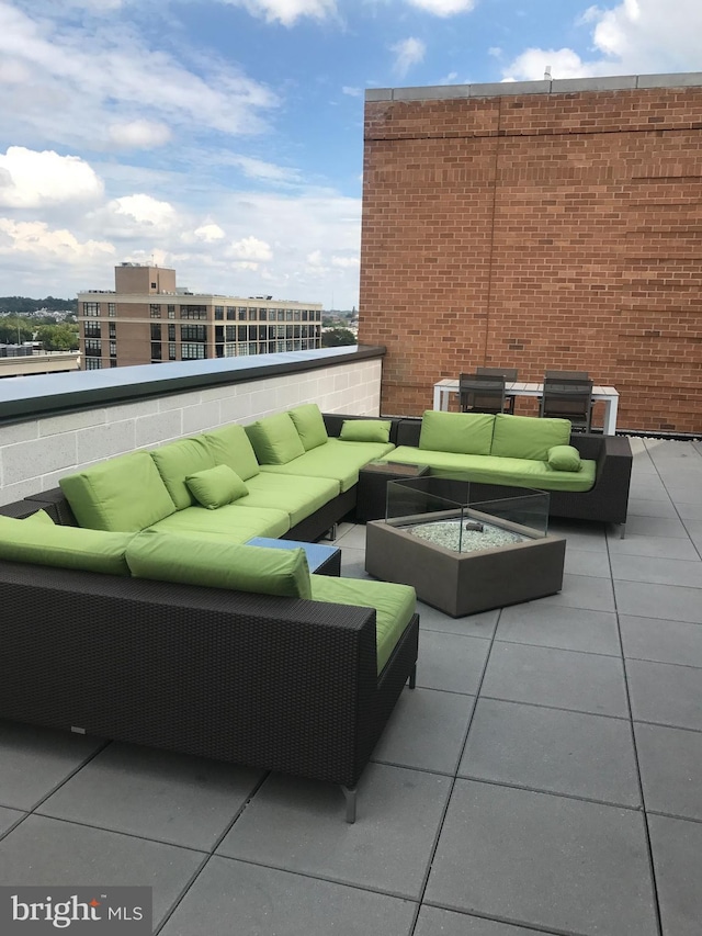 view of terrace featuring outdoor lounge area and a balcony