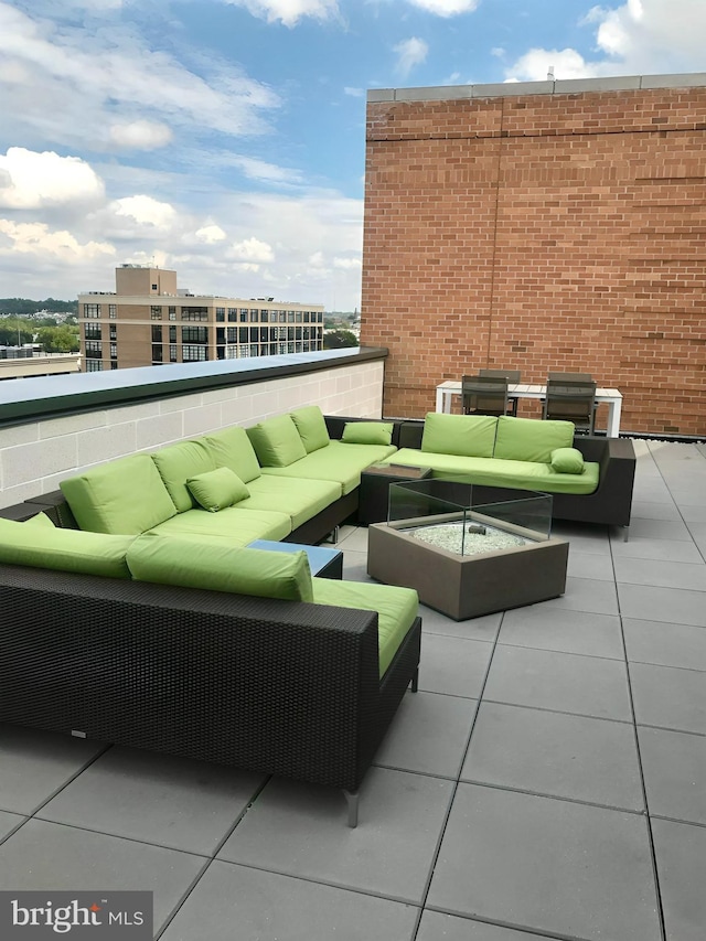 view of patio / terrace featuring a balcony and outdoor lounge area