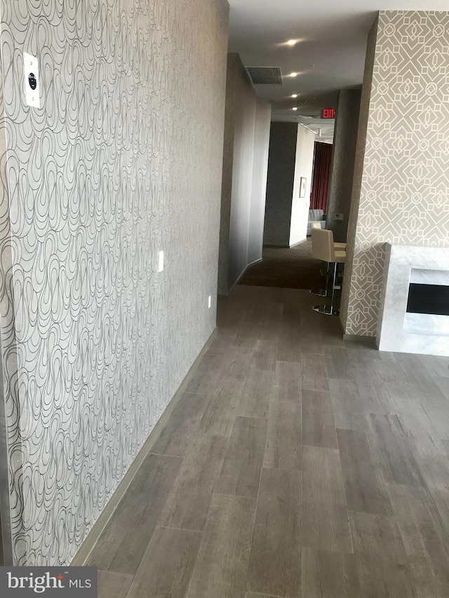 hallway featuring hardwood / wood-style flooring