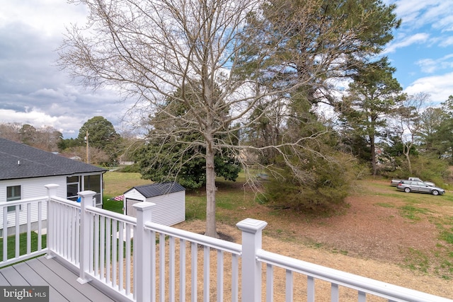 deck featuring an outbuilding