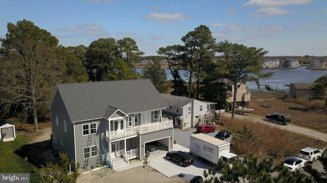 aerial view featuring a water view