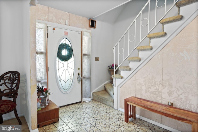 entryway featuring light tile floors