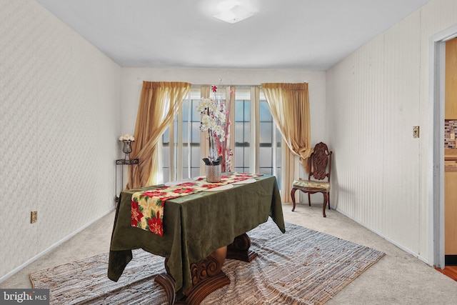 recreation room featuring light colored carpet