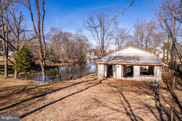 view of front of house featuring a water view