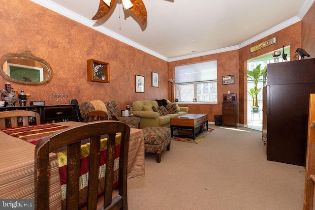 bedroom featuring crown molding, carpet, and ceiling fan