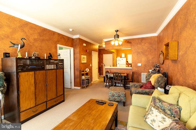 living room with light colored carpet, ceiling fan, and ornamental molding