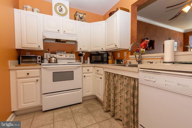 kitchen featuring white appliances, white cabinetry, sink, light tile floors, and ceiling fan