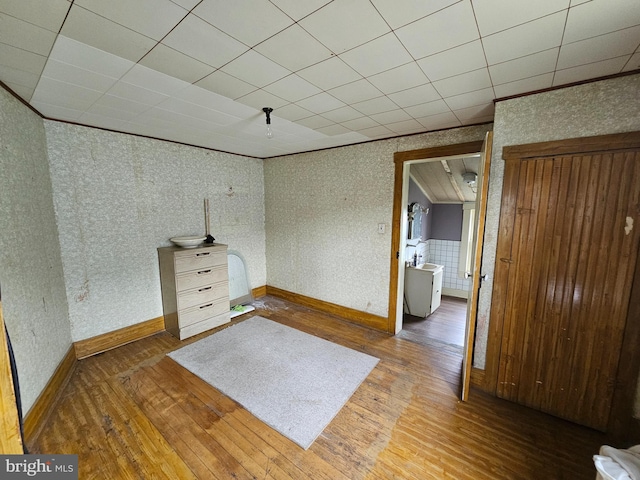 unfurnished bedroom featuring dark wood-type flooring