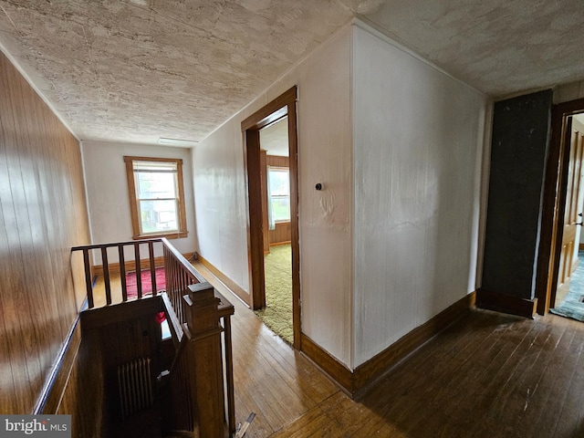 corridor with dark wood-type flooring