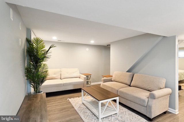 living room with light hardwood / wood-style floors