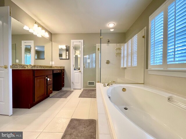 full bath with vanity, visible vents, a stall shower, tile patterned flooring, and a garden tub