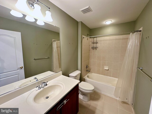 bathroom featuring tile patterned flooring, visible vents, toilet, shower / bath combo, and vanity