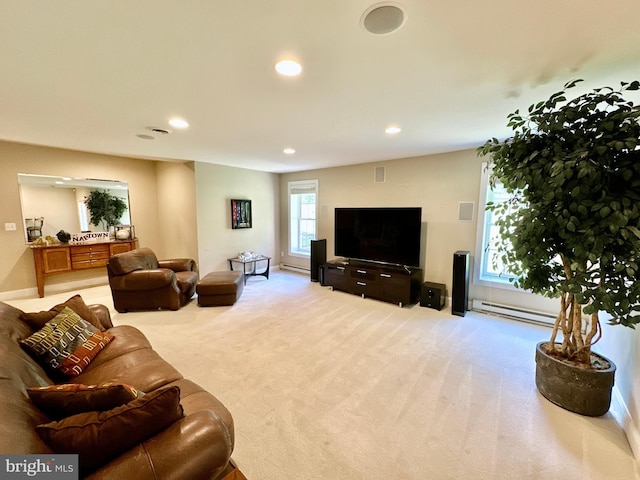 living area with recessed lighting, baseboards, baseboard heating, and carpet flooring