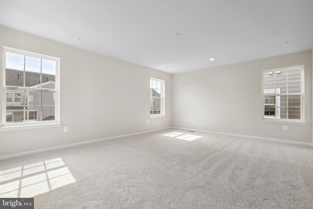 view of carpeted spare room