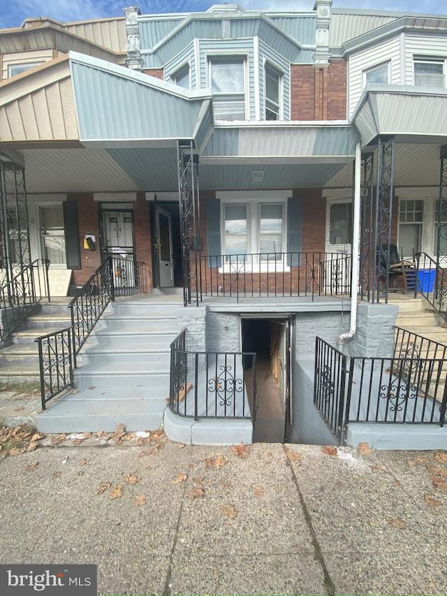 exterior space featuring covered porch