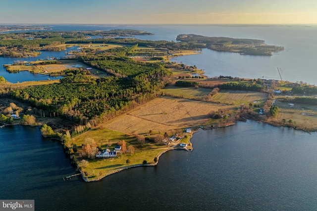 aerial view at dusk with a water view