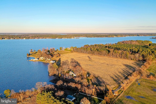 aerial view at dusk with a water view