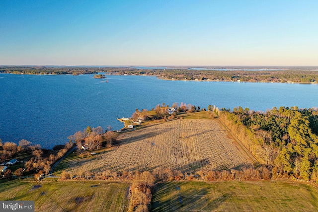 aerial view at dusk with a water view