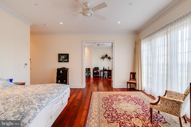 bedroom featuring crown molding, ceiling fan, and dark hardwood / wood-style floors